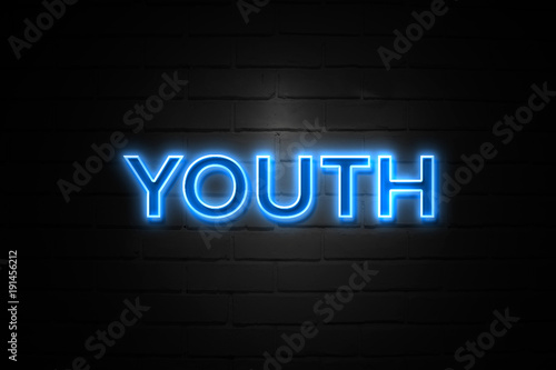 Youth neon Sign on brickwall