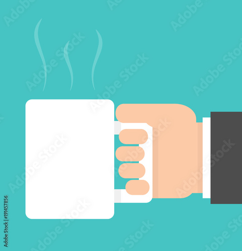 Hand holding a white mug