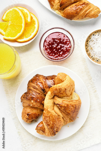 Continental breakfast with croissants