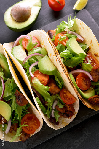 Tacos with meat and vegetables