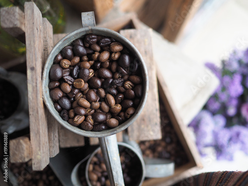 Coffee beans in zinc bucket. photo