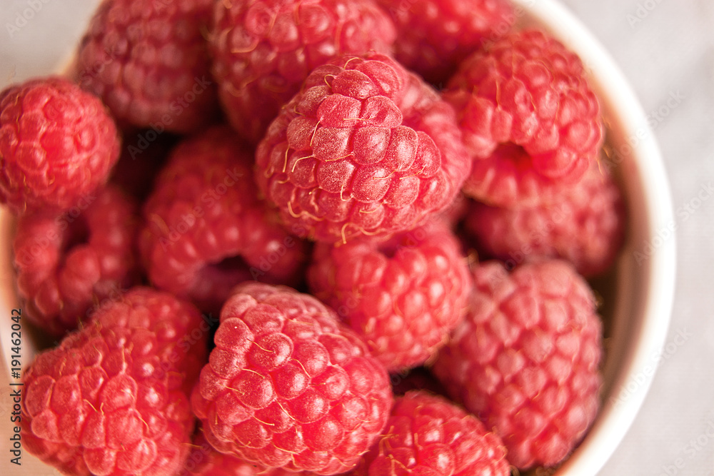 Vitamins. Summer berries. Raspberries background. Close up, top view, high resolution product. Harvest Concept Vitamins. Summer berries. Raspberries background. Close up, top view, high resolution product. Harvest Concept