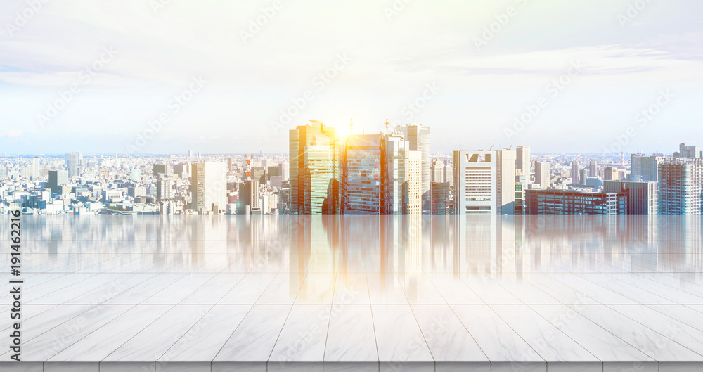 Business concept - Empty marble floor top with panoramic modern cityscape building bird eye aerial view under sunrise and morning bright sky of Tokyo, Japan, for display or montage product.