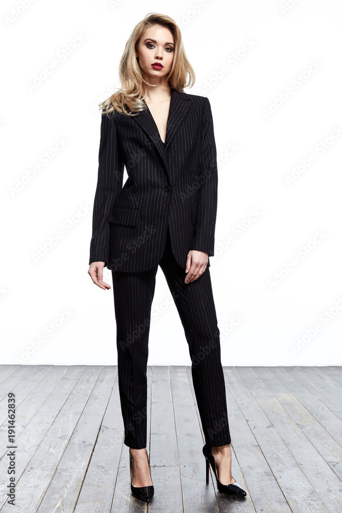 Føderale Hvor fint Søg Beautiful elegant business woman blond hair wear style fashion formal dress  code black suit pants and jacket pretty lady clothes office meeting white  background collection heath boss secretary. Stock-foto | Adobe Stock