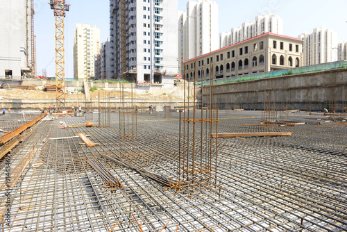 Wallpaper Mural Construction workers in work, in the construction site Torontodigital.ca