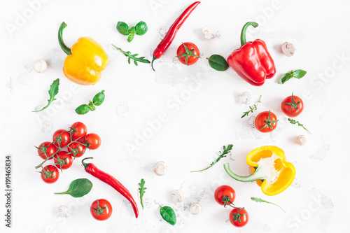 Healthy food on white background. Vegetables, tomatoes, peppers, green leaves, mushrooms. Flat lay, top view, copy space