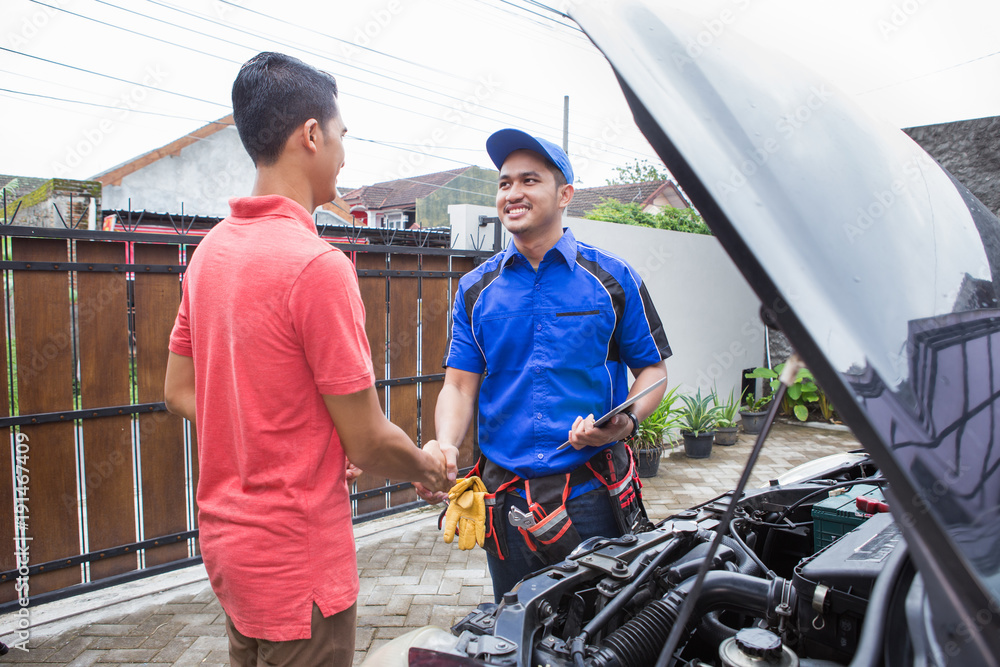 technician shake hand with customer technician shake hand with customer