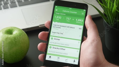 Using calorie counting app on the smartphone photo