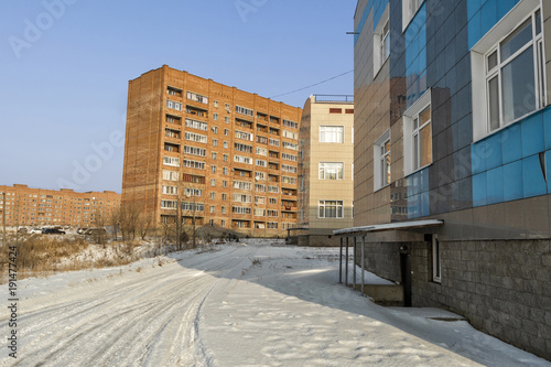 Multi-storey residential buildings and secondary school. Modern architecture. Kazakhstan  Ust-Kamenogorsk