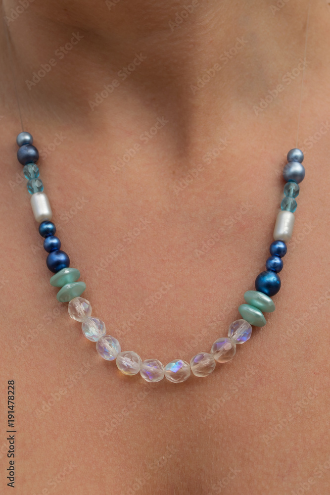 Costume jewelry on bare skin of women Costume jewelry on bare skin of women