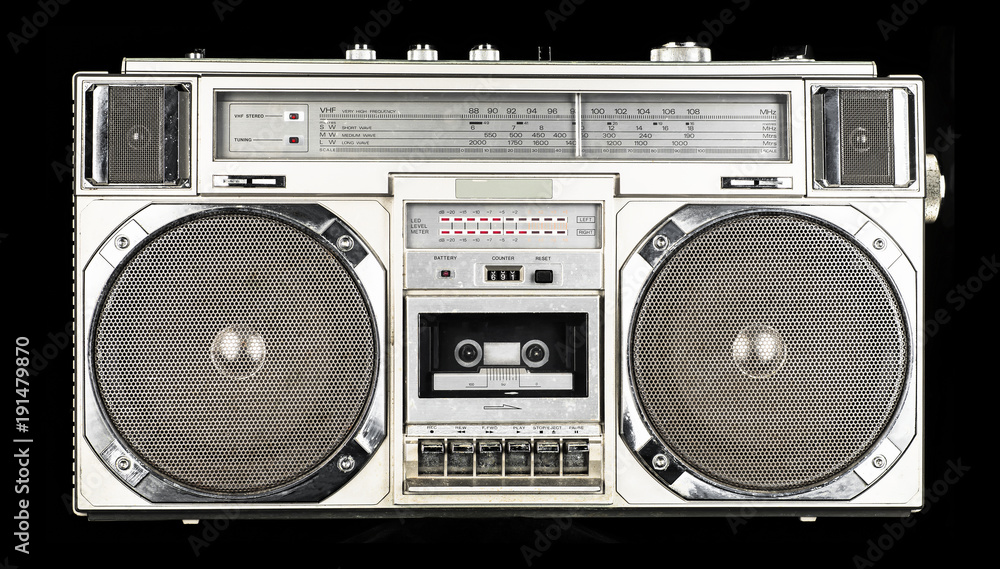 Retro old radio cassette tape recorder isolated on black background Stock  Photo | Adobe Stock