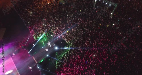 A huge bright concert. People having fun. Air recording(drone)