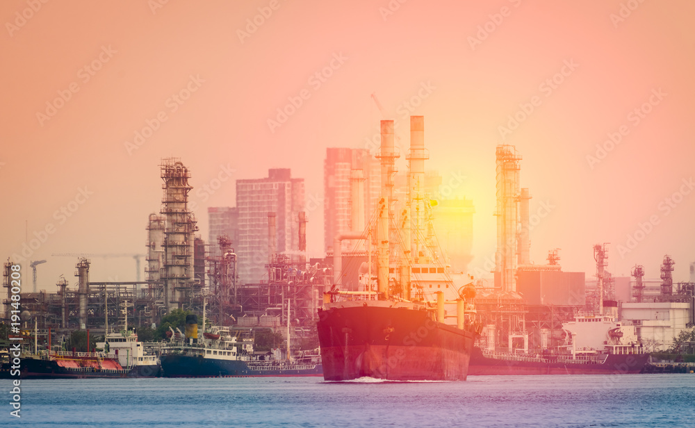 Container Cargo ship in a harbor under sunlight and industry background. Container Cargo ship in a harbor under sunlight and industry background.