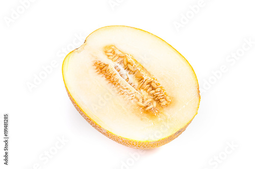 Half honeydew melon tropical fruit isolated on a white background.