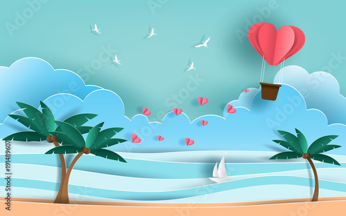 Paper art style of origami heart shaped hot air balloon flying in the air over beautiful beach with many hearts floating, flat-style vector illustration.