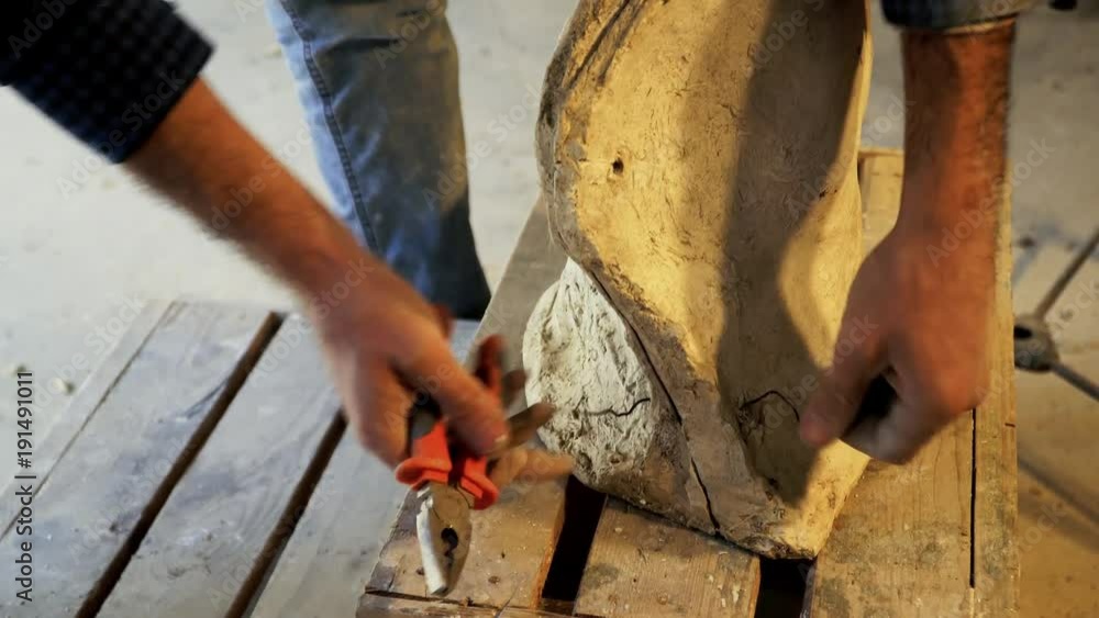 Sculptor work with gypsum Sculptor work with gypsum