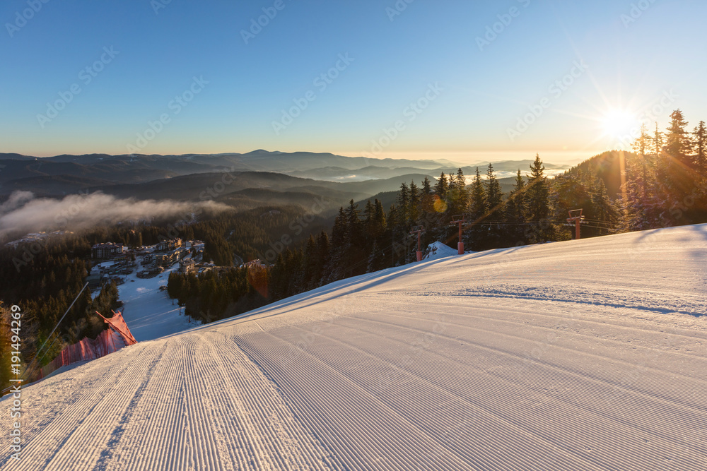 Ski slope at sunrise