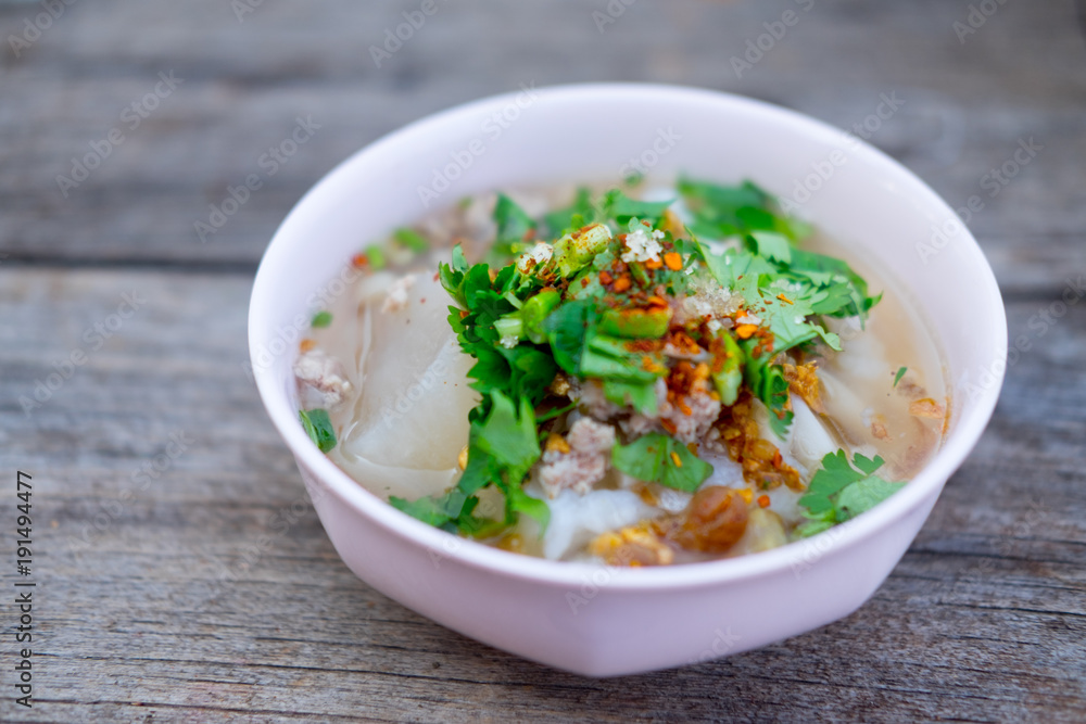 Rice boiled with pork garlic and coriander bowl
