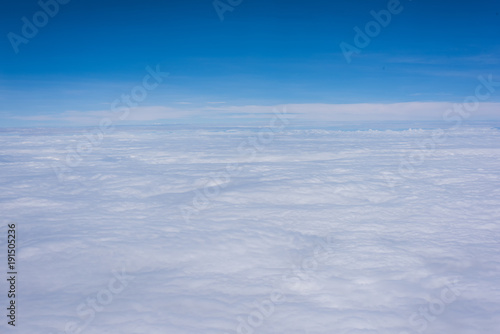 Beautiful blue sky and white could wallpaper background from air plane window © Guitafotostudio