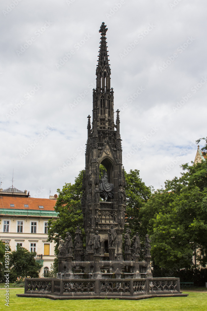 A grand medieval fountain on the street of Prague. Czech Republic