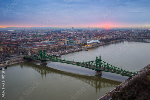 Budapest, Hungary - Beautiful Liberty Bridge and sunrise taken from Gellert Hill at winter time