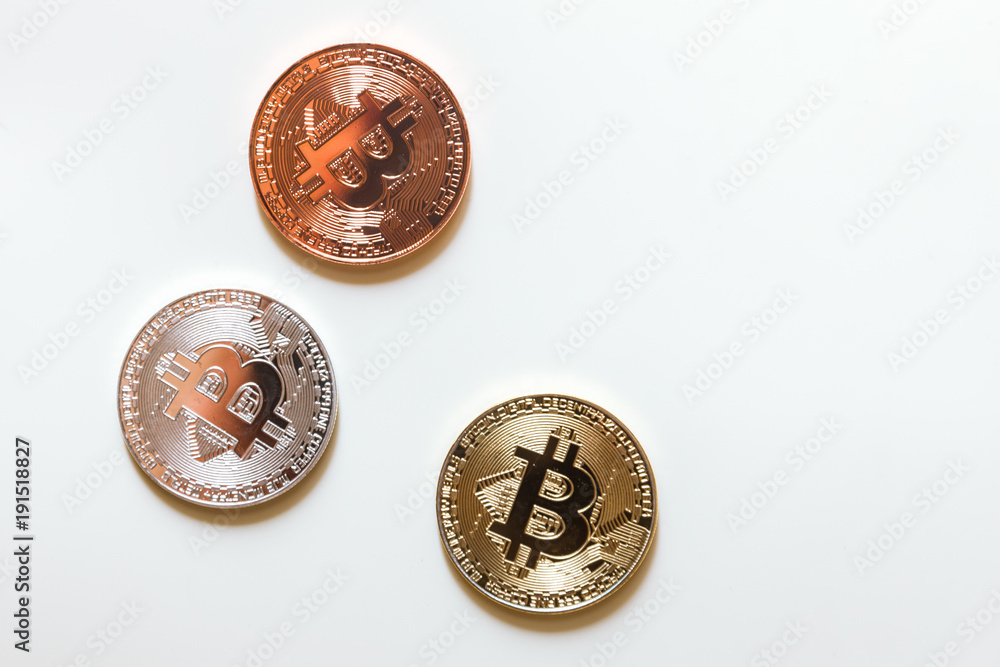 gold copper silver bitcoin isolated on white background