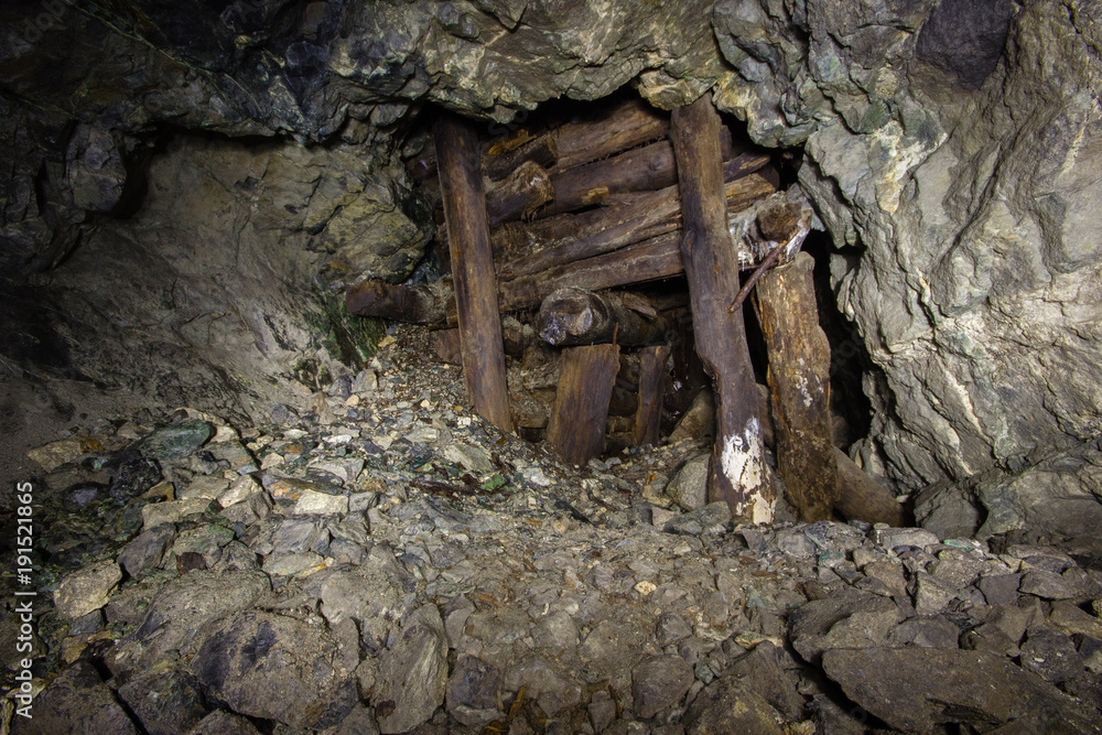 Underground Abandoned Gold Ore Mine Shaft Tunnel Gallery With Wooden Timbering Stock Photo