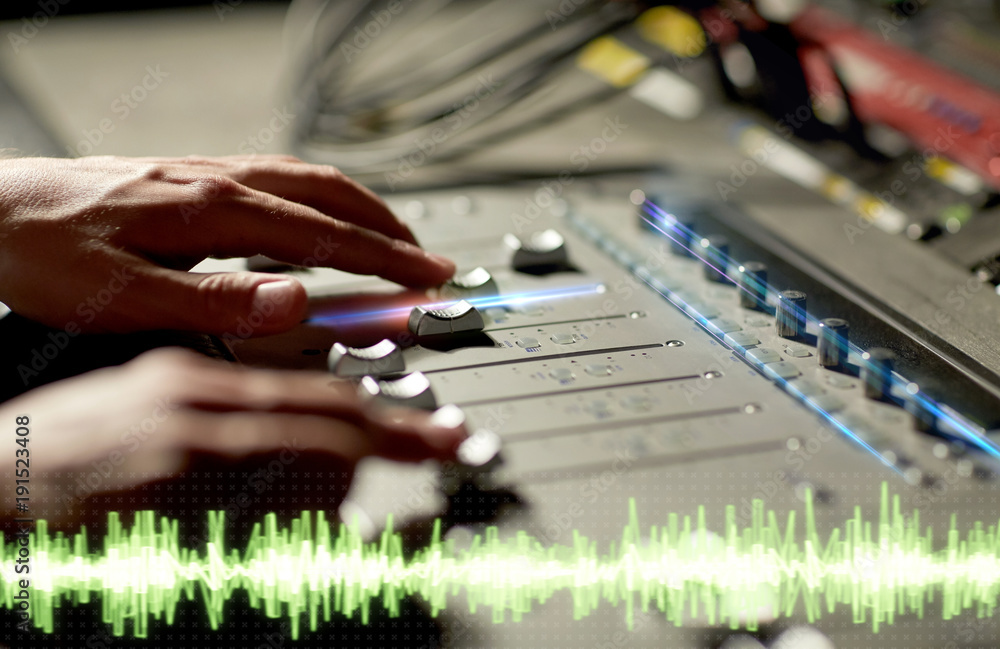 hands on mixing console in music recording studio hands on mixing console in music recording studio