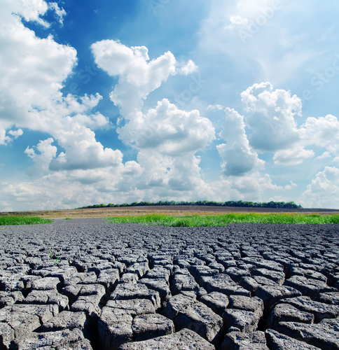 dramatic sky over cracked earth