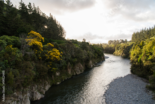 Landscape view of a river from the top of a bridge in New Zealand. 