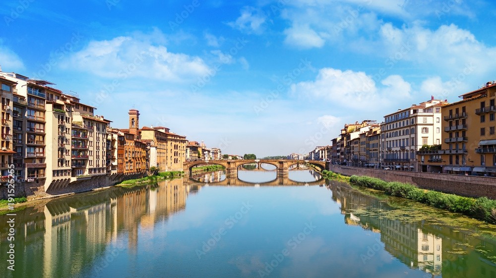 Famous landmark of Florence is the Bridge Trinity. Renaissance bridge over river Arno. Italy, June 2017. Ponte Santa Trinita.