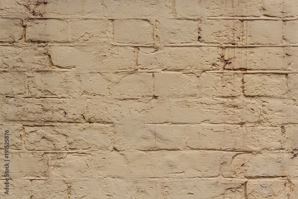 Obraz premium Background of old vintage dirty brick wall with peeling plaster, texture