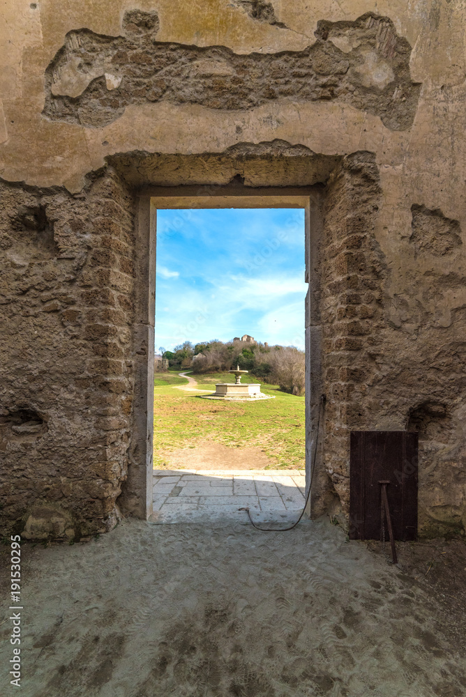 Fototapeta premium Monterano (Italy) - A ghost medieval town in the country of Lazio region, located in the province of Rome, perched on the summit plateau of the hill tuff.