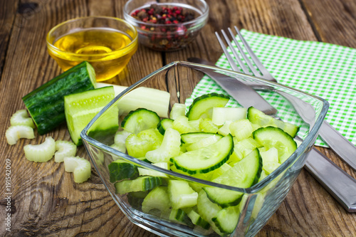 Fresh cucumber, stalks of celery for healthy food, diet menu