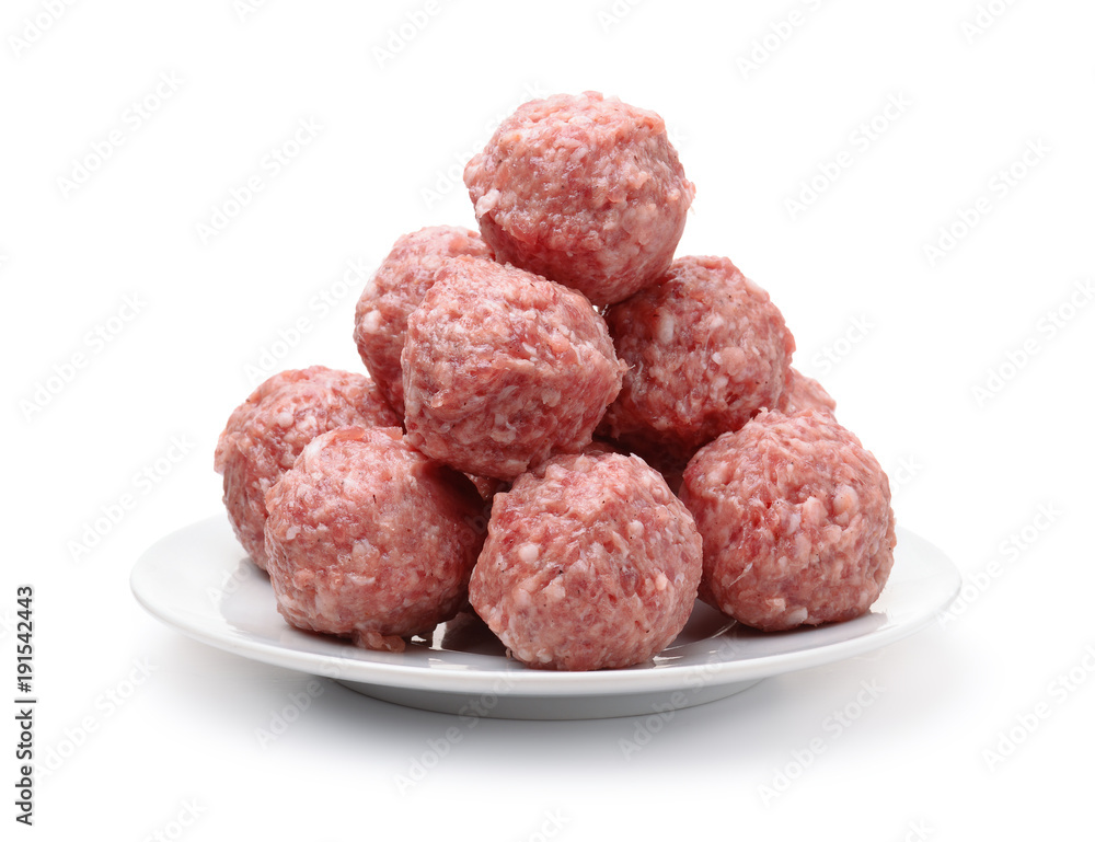 Heap of fresh raw meatballs on plate Heap of fresh raw meatballs on plate