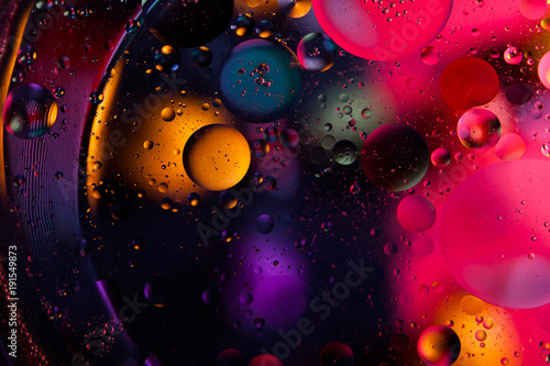 Abstract space background. Water drops of different colours