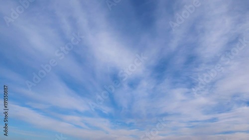 Time laps of clouds on blue sky photo