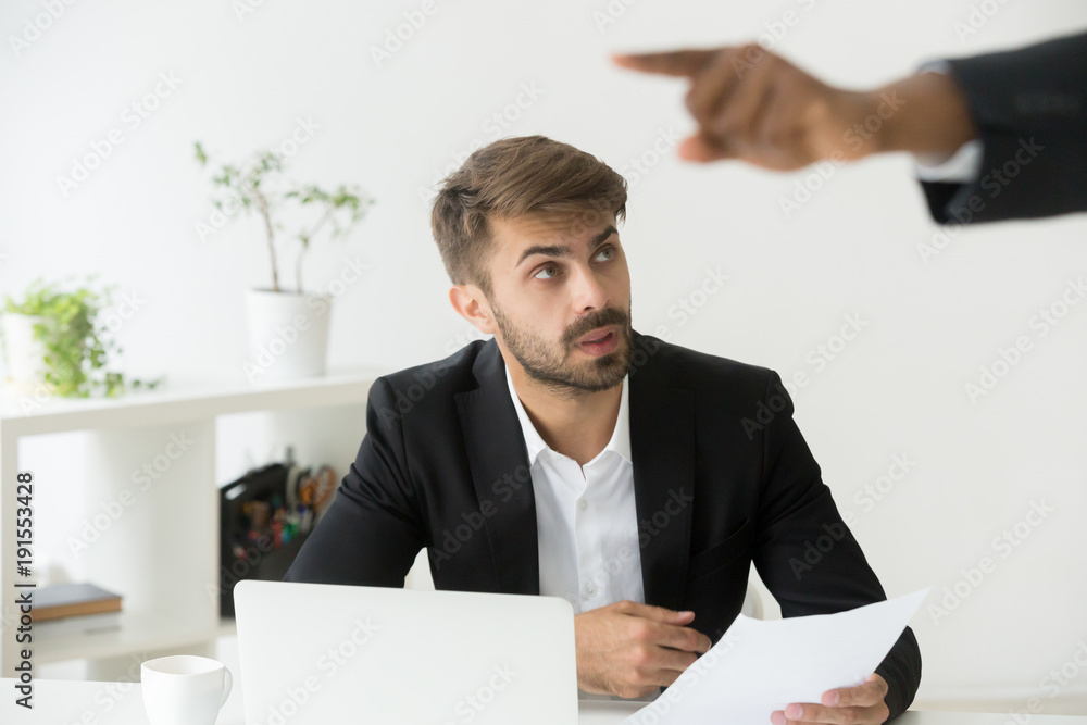 Black boss firing shocked white employee stunned by dismissal notice, confused office worker frustrated by unfair termination looking at executive discharging subordinate with gesture, getting fired Black boss firing shocked white employee stunned by dismissal notice, confused office worker frustrated by unfair termination looking at executive discharging subordinate with gesture, getting fired