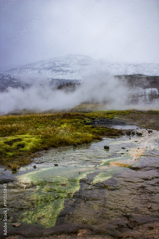 Colorful Mineral Deposits at One of the Geysers at Strokker Geysir Field in the Golden Circle of Iceland Colorful Mineral Deposits at One of the Geysers at Strokker Geysir Field in the Golden Circle of Iceland