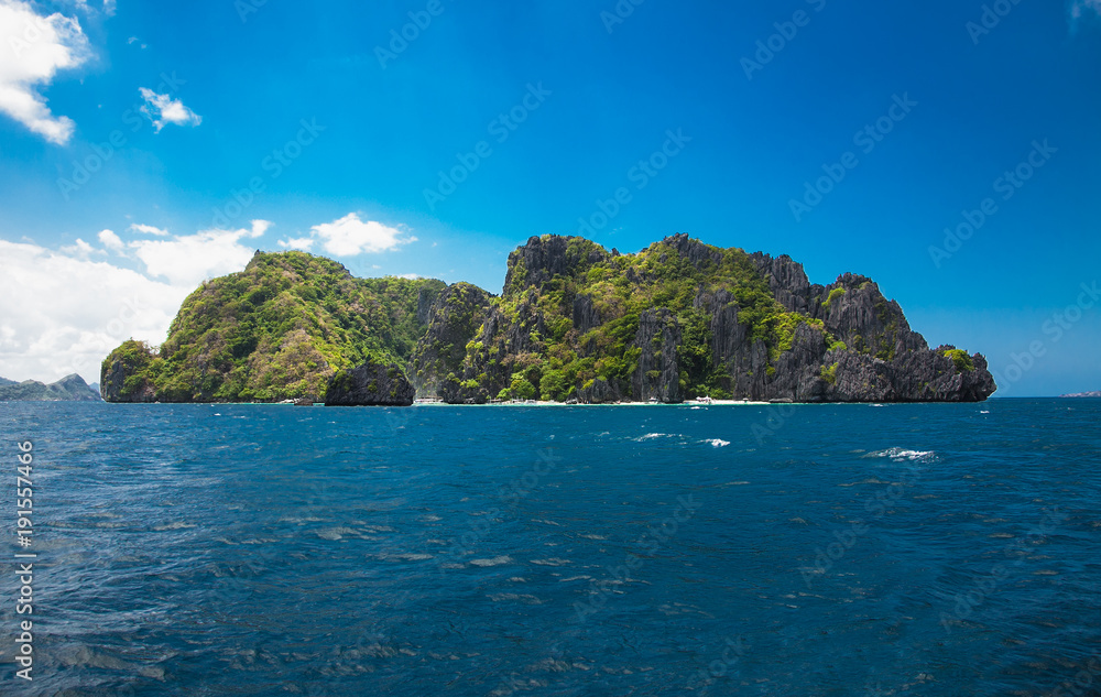  Scenic landscape with mountain islands and blue lagoon El Nido at Palawan. Philippines.