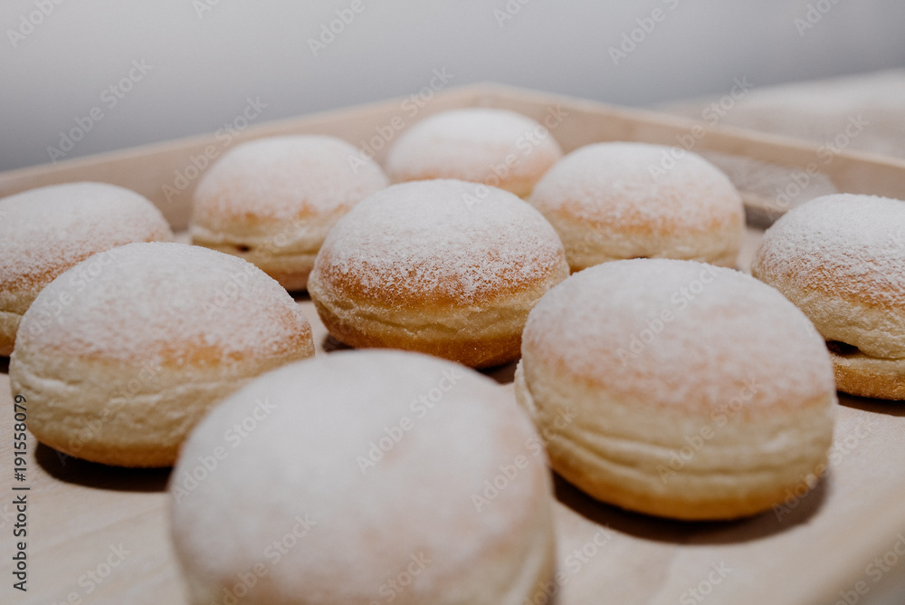 Donuts on plate on woode board Donuts on plate on woode board