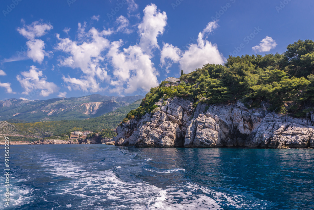 View from sea on rocks in shore of Przno, small resort village near Budva, montenegro