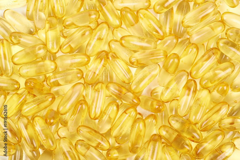 Surface covered with softgel pills Surface covered with softgel pills
