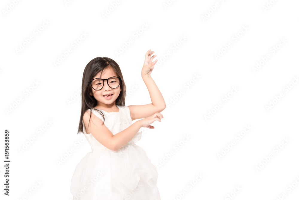 Portrait of happiness little cute asian kid girl dancing isolated on white background ,Adorable girl having great time for learning freedom concept Portrait of happiness little cute asian kid girl dancing isolated on white background ,Adorable girl having great time for learning freedom concept