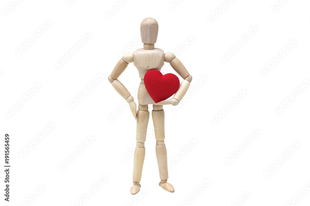 Wood Figure Mannequin holding a red heart on white background Wood Figure Mannequin holding a red heart on white background