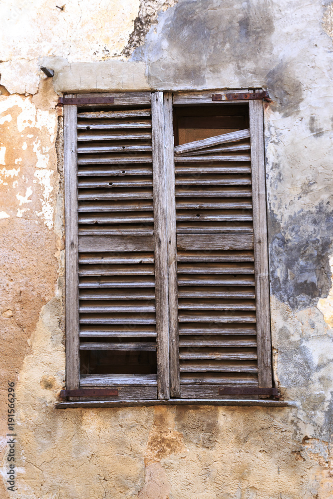 Europe, Spain, Balearic Islands, Mallorca. Wood shuttered window. Europe, Spain, Balearic Islands, Mallorca. Wood shuttered window.