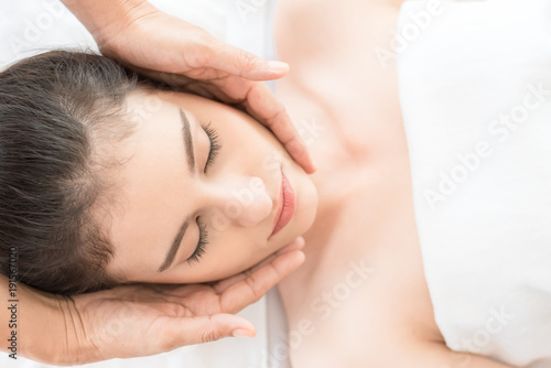 closed up,Young healthy asian woman lying relax in spa salon.Traditional Thai oriental aromatherapy and Massage beauty treatments.Recreation vitality wellness wellbeing resort hotel lifestyle leisure