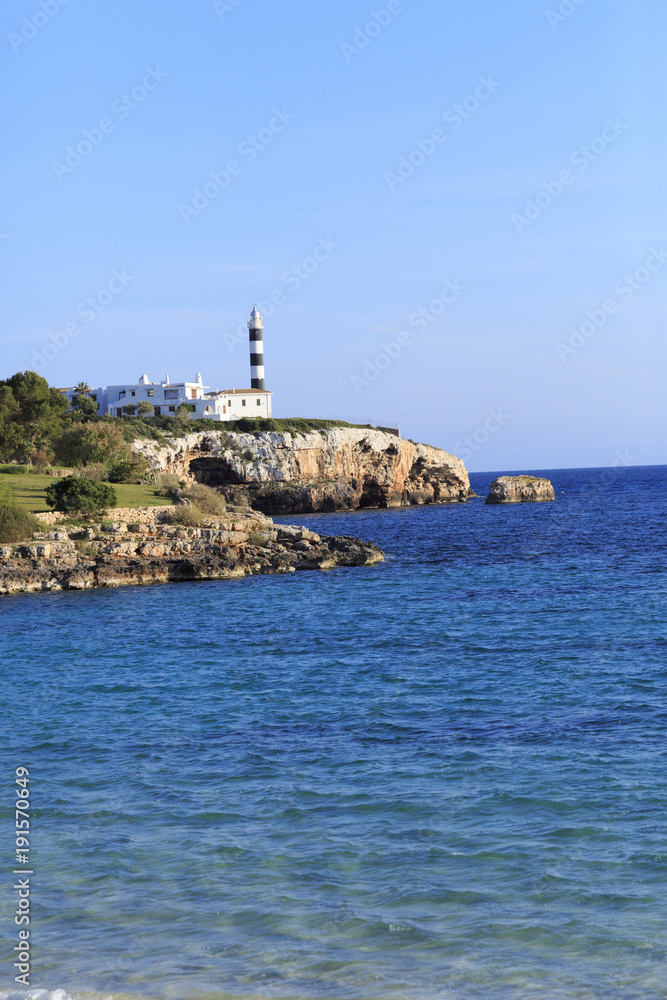 Europe, Spain, Balearic Islands, Mallorca. Porto Colom. lighthouse.