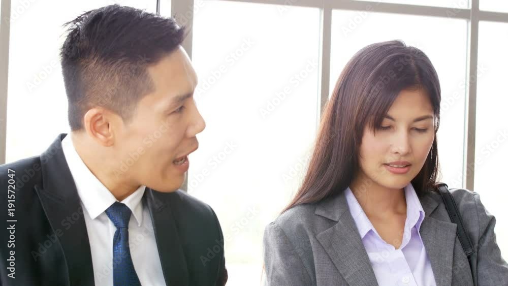 Asian people talking for business together. Business man and woman working together. People with business concept. Asian people talking for business together. Business man and woman working together. People with business concept.