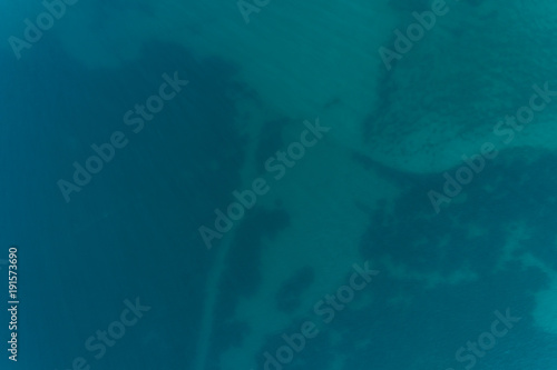 Aerial view of the rocky bottom of the Adriatic Sea covered water